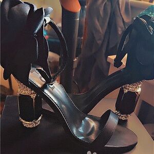 Chic Black Heels with Gold Embellishments